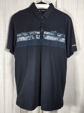 TravisMathew Black Polo with Light Blue Stripe Detail